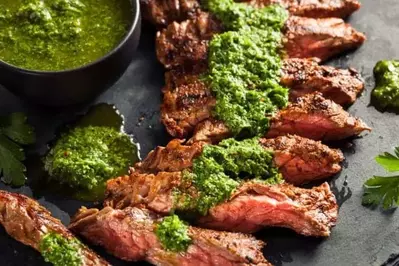 sliced steak with chimichurri