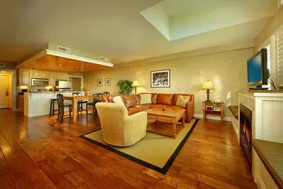 The living room and kitchen of a Pigeon Forge condo.