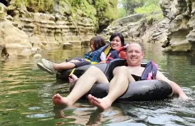 people tubing in the river