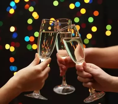 Women toasting with champagne glasses